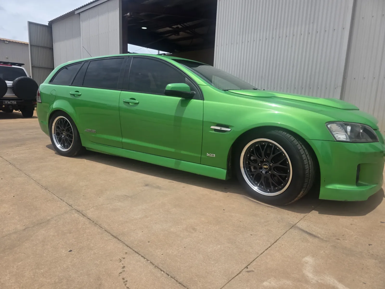 Green Holden Commodore sedan with full car detailing by Kimberley Auto Care
