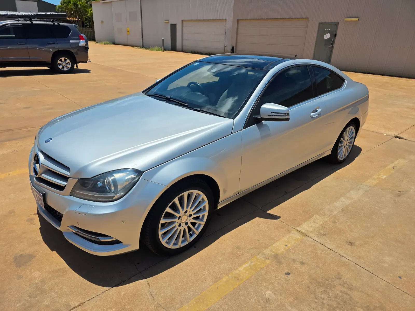 Silver Mercedes-Benz C-Class coupe with showroom-quality paint finish after professional detailing by Kimberley Auto Care