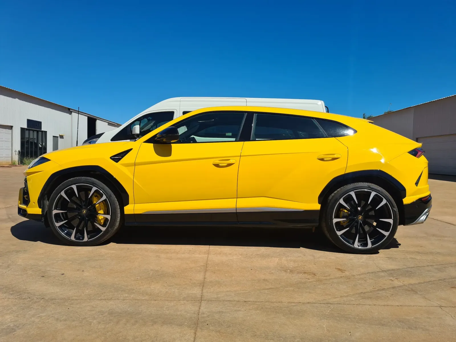 Yellow Lamborghini Urus SUV with window tinting and detailing completed at Kimberley Auto Care in Broome